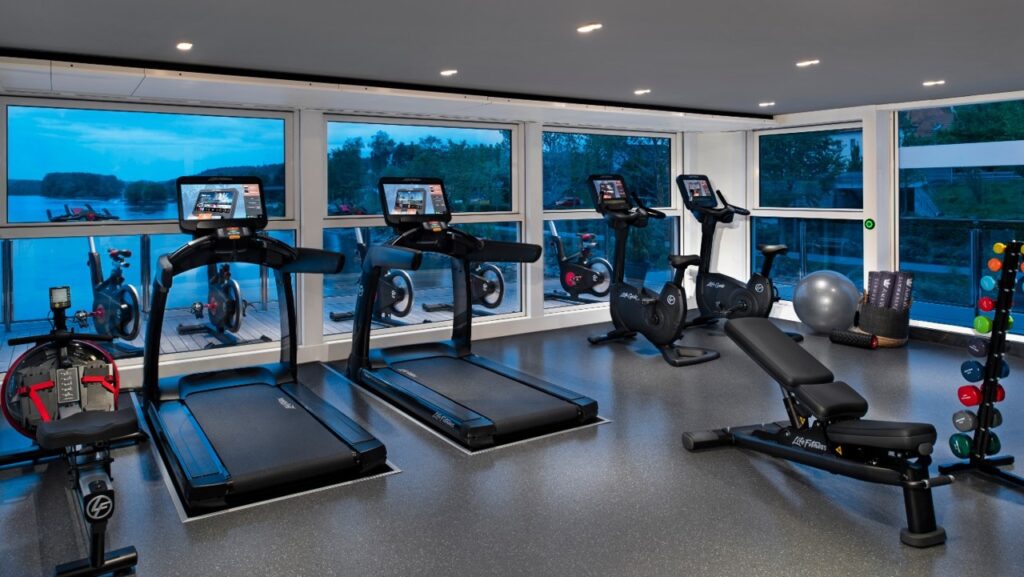 Golf Ahoy Danube River Golf Cruise AmaMagna fitness equipment in gym with a view outside windows