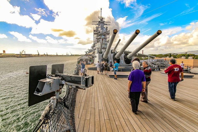 GolfAhoy Hawaii Golf Cruises photo of onboard visitors on battleship pearl harbor.