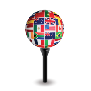 Photo of golf ball on tee showing flags of different countries.