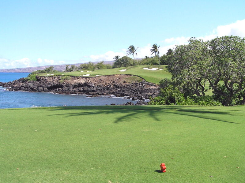 View of signature hole at Mauna Kea golf course Hawaii.