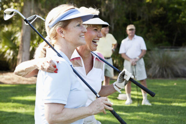 Lady golfers on golf course GolfAhoy Safrica Sun Tours travel advisors create bespoke five-star Southern Africa golf, winery, and safari tours.